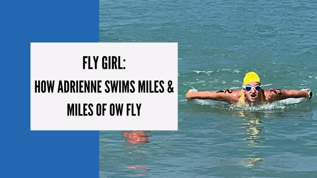 How Adrienne swims miles and miles of open water fly. A woman swims butterfly in a lake while wearing a yellow cap and blue goggles