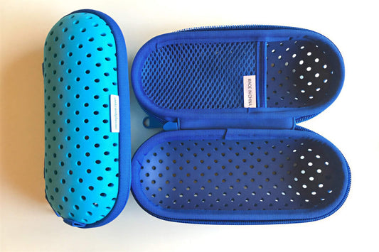 The Snake & Pig goggle case comes in four colors - light and royal blue are shown here