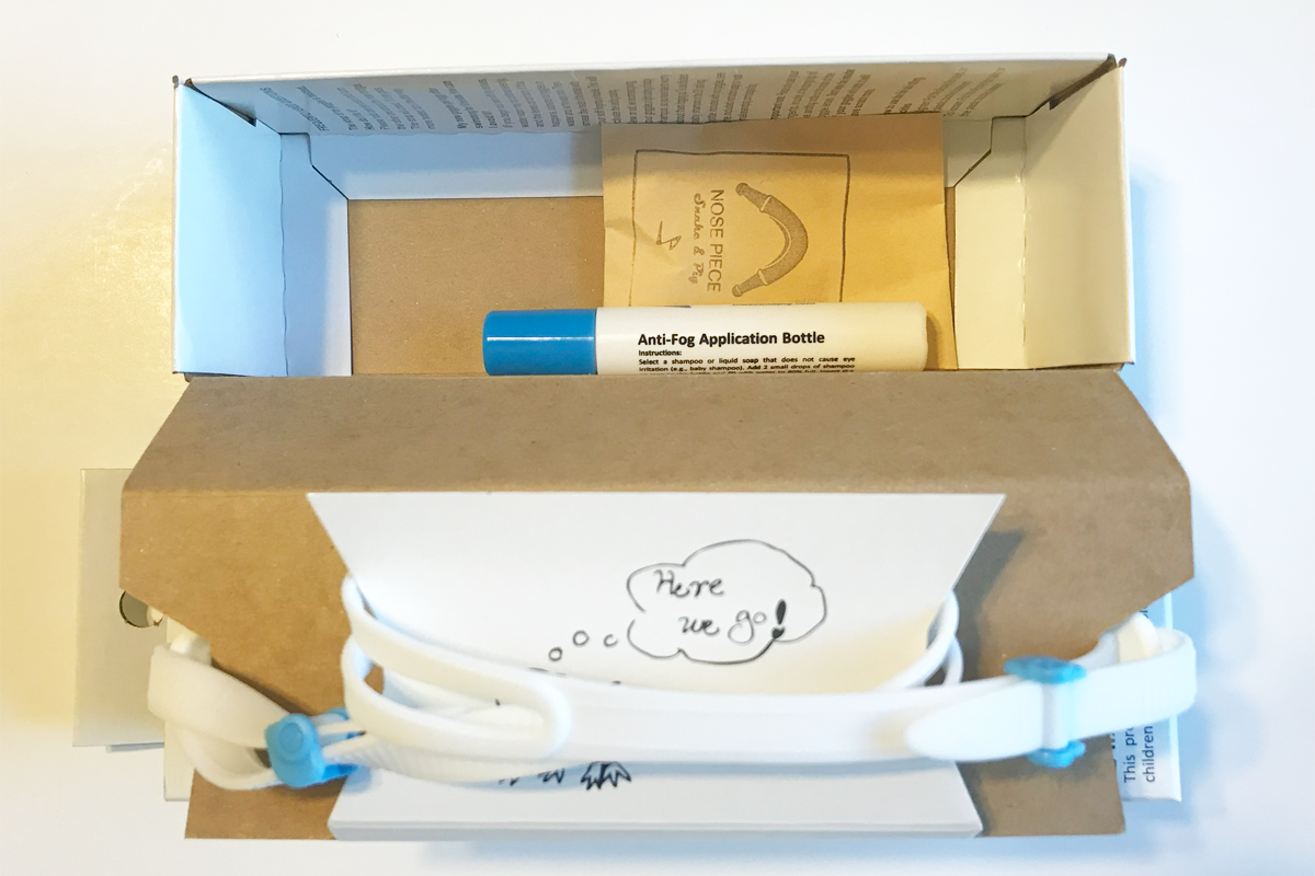 You can find the extra nosepieces and anti-fog application bottle under the goggles at the bottom of the inner box