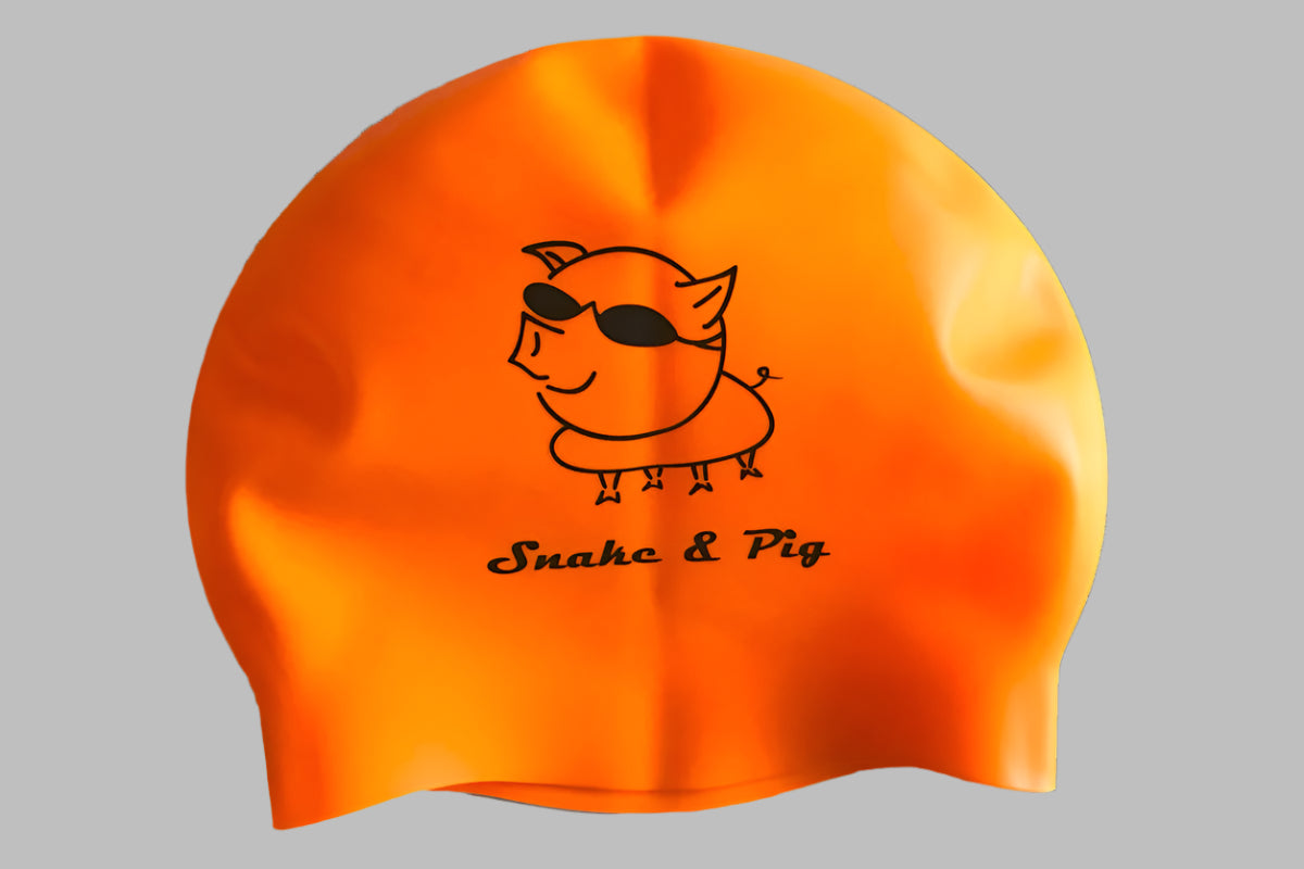 A neon orange swim cap for open water swimming; Snake & Pig logo printed in black