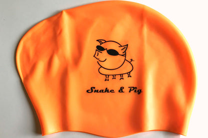 Bright orange swim cap for long hair. Snake and Pig Sports logo in black print.
