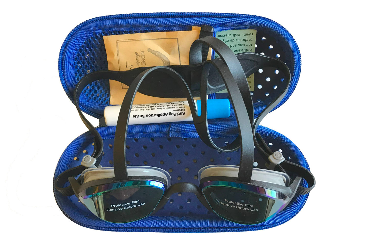 A pair of top anchor goggles inside a dark blue goggle case, along with an instruction sheet, anti-fog bottle, and a small paper packet containing two extra nose pieces. All these items are included in a top-anchor goggles purchase.