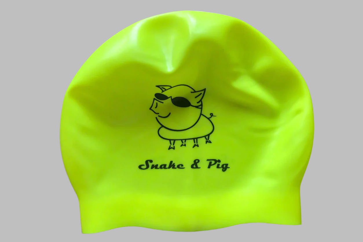 Neon yellow swim cap with black print: Snake and Pig and big pig logo