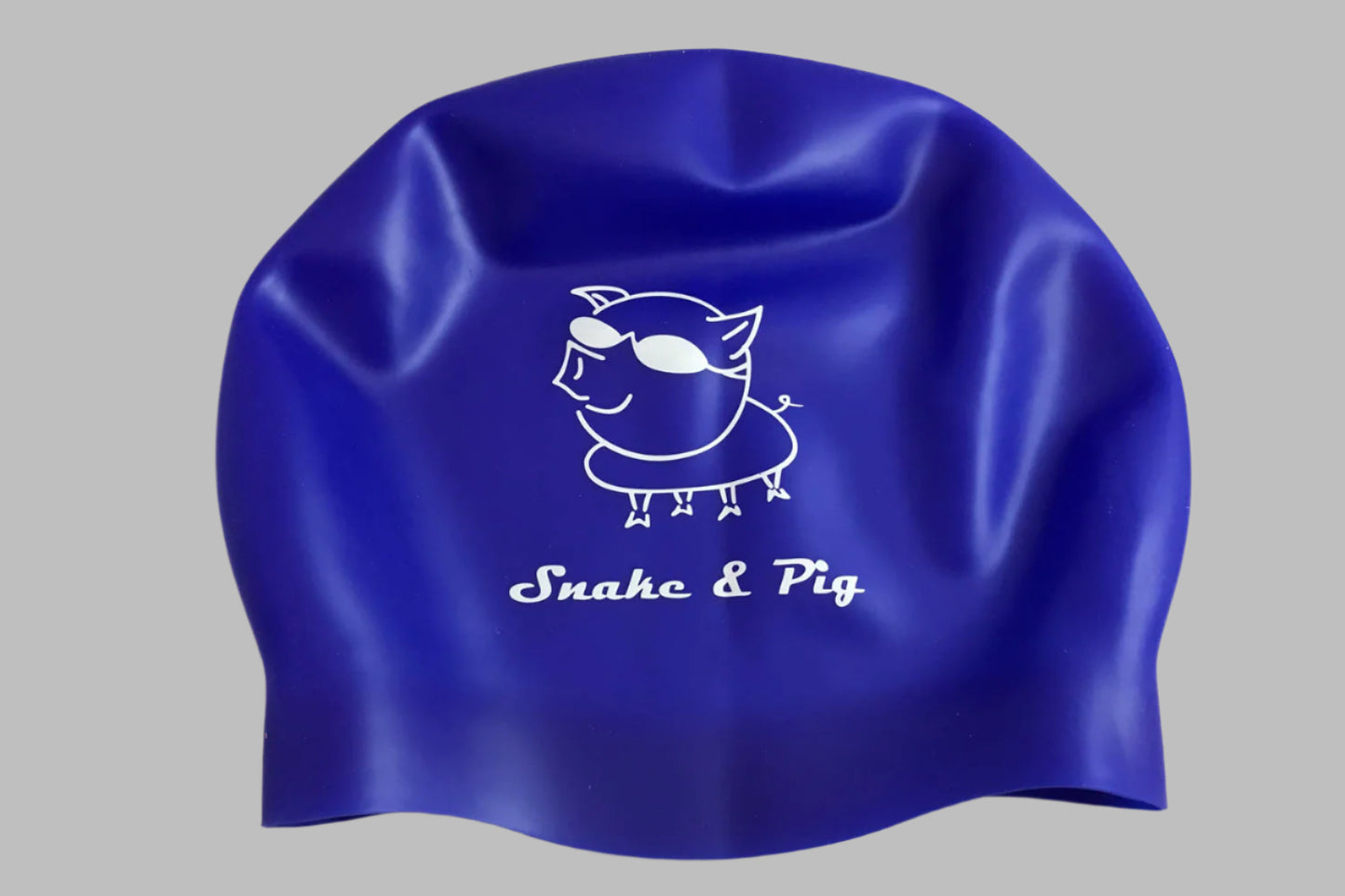 Snake & Pig logo printed in white on a royal blue silicone cap