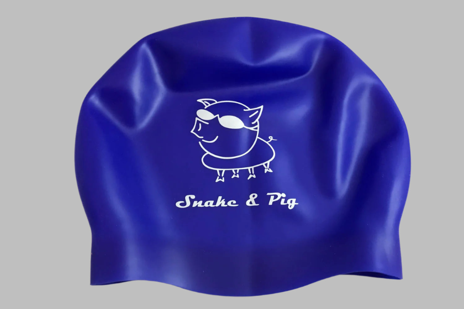Snake & Pig logo printed in white on a royal blue silicone cap