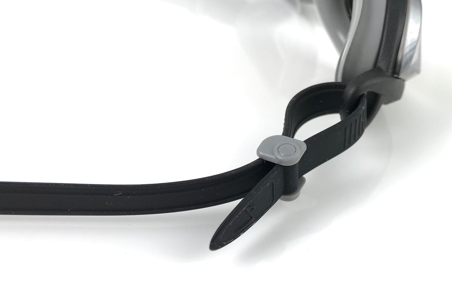 Detail view of the unique fishtail rolling buckles for the side straps.