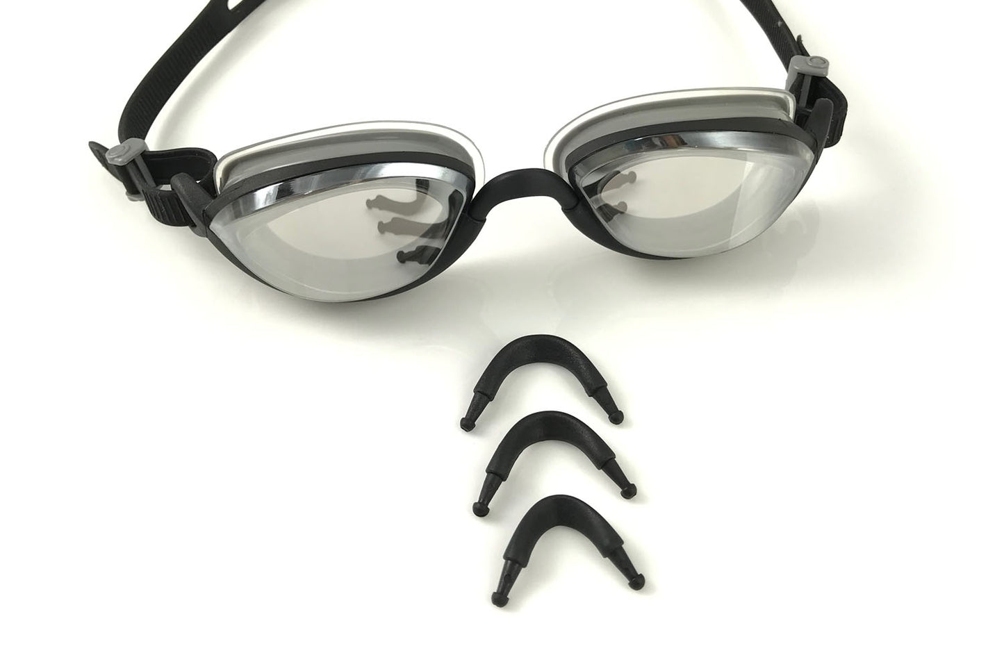 Pair of Basilisk goggles and the three sizes of nose pieces available.