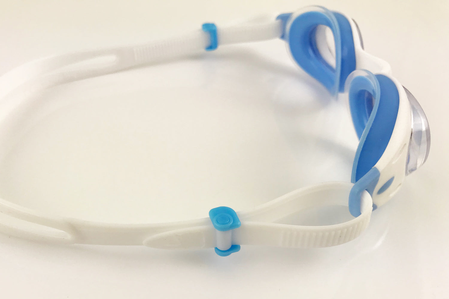 side view of Junior basilisk goggles - they can be easily adjusted using the fishtail rolling buckles on each side