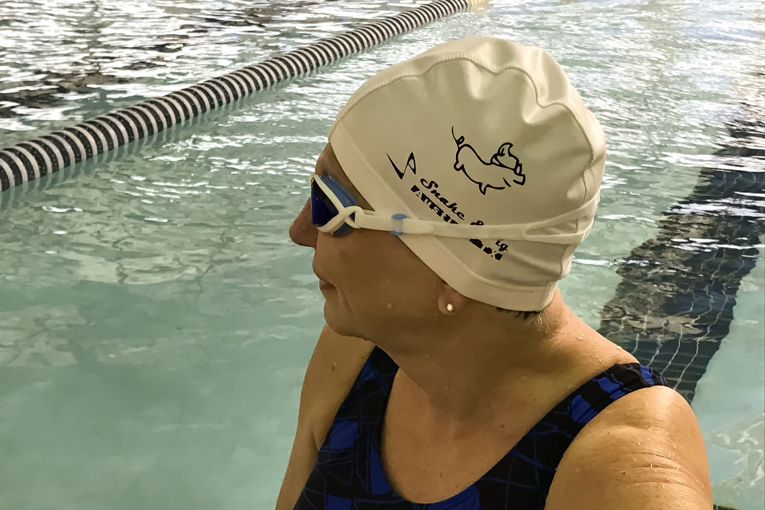 Woman wearing a lycra swim cap from Snake and Pig 