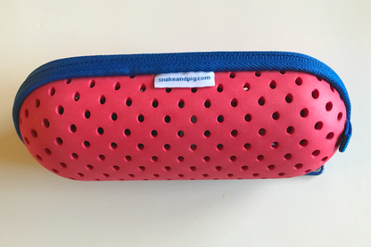 Pink foam swim goggle case with a royal blue zipper